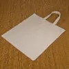 Sac en coton 38 x 42 cm avec des poignées courtes  - naturelle En voyage