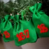 Calendrier de l'Avent sacs de jute 13 x 18 cm - vert + chiffres rouges Tous les produits