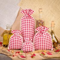 Sachet en lin imité 16 x 37 cm avec l'impression - naturel / treillis rouge Sac avec impression