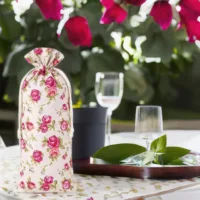 Sachet en lin imité 16 x 37 cm avec l'impression - naturelle / roses En voyage