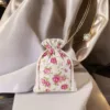 Sachets en lin imité 12 x 15 cm avec l'impression - naturelle / roses Baby Shower