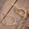 Calendrier de l'Avent sachets en jute 12 x 15 cm - gris + chiffres rouges Produits