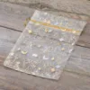 Sacs en organza 15 x 20 cm - Noël / 8 Cosmétiques