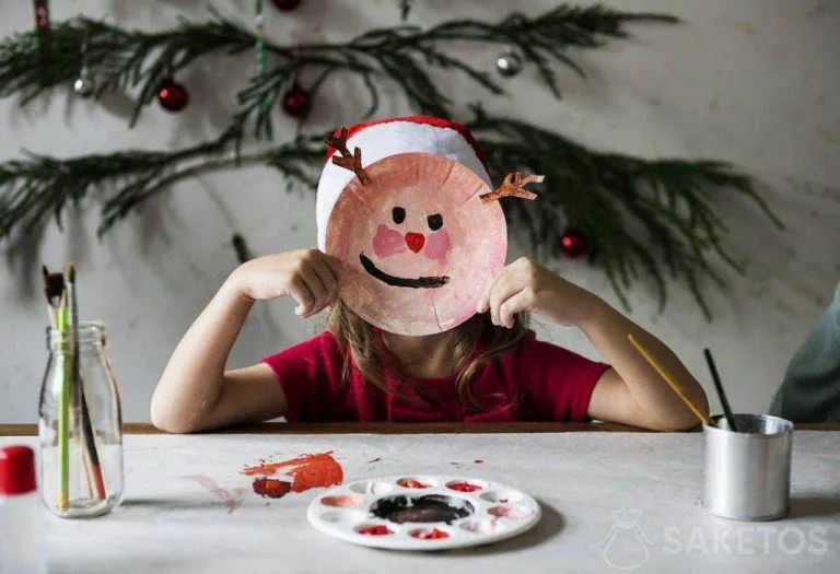 Décorer sa maison pour Noël est l'occasion de s'amuser avec son enfant !