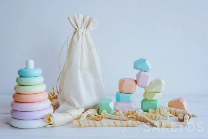 2. Les aides à la Montessori dans un sachet éco en lin