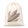 Sac à pain en tissu effet lin blanc avec cordon de serrage et illustration de baguettes de pain.
